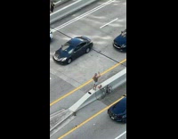 Man sleeveless shirt tiktok dance middle highway