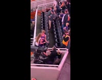 Couple pose at sports game