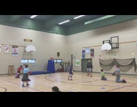 man in grey throws dodgeball at kid in red 
