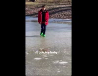 Kid dances on frozen lake falls in water