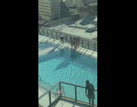 Five women bikini lineup dance poolside party