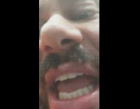 Guy jumps on top of stack of aerobic steps, knocks them all down and falls on gym floor