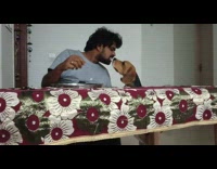 Guy feeds dog food using his mouth 