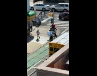 Man Poses for Photos in the Street 
