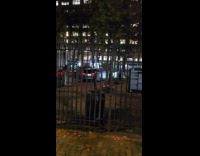 Street blocked car drives through the park