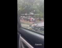 Collab WINY - Filmer in car pass by flooded street