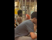 Collab WINY - Man stare at chucky doll in train