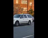 Man reflective jacket ride tall unicycle street