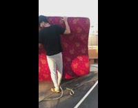 Guy grey hoodie rap video rooftop building