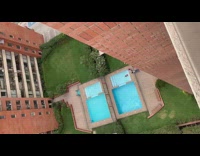 Woman red top lie down pool stairs