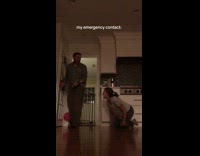 Woman in kitchen scares husband