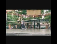 White shirt guy orange jumprope tricks 