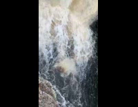 Man does flip jumping into falls 