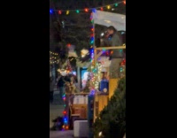 DJ sets Christmas tree stand plays music