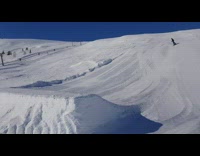 Snowboarder Rides Down Hill and Tries to Flip Off Ramp Hits Head