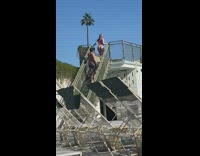 Woman in bikini flexes butt on the tower Part 2