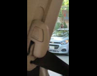 Lady does backbend by superhero arch decoration 