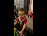 Little kid fake acts dramatic when shot by nerf gun