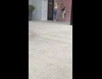 Woman bend over stick tongue out wall