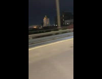 Bicyclist on highway blocks NYPD car night