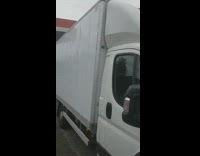 Bird poop on white delivery truck 