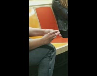 Lady clips toenails on subway pinks slippers 