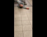 Grey shirt guy passed out stairs subway