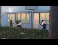 Three women dance music video shoot blue house