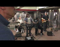 band four people playing in subway