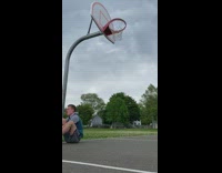 Guy touches basketball rim falls down fail