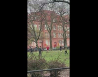 Group of Guys Dance on Grass to Music 