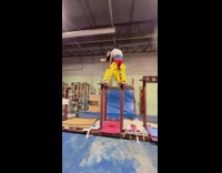 Two men danced and jumped on top of the poles