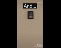 Guy tiny photo of brother on wall 