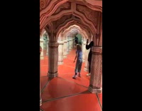 Lady Laugh with Kids inside Mirror Maze