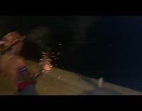 American flag cowboy hat guy lights firework 