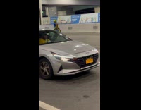 Man green vest dance on the road