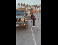 Women group tiktok dance gray Jeep truck