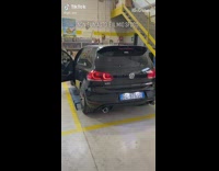 Guy washes black car puts sticker on 