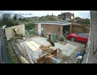 Woman stands inside the shed then roof fell on her