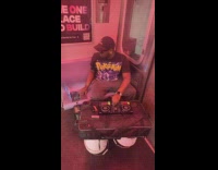 People partying enjoy music played by DJ