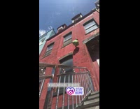 Girl rope lift yellow groceries apartment window 