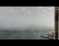 Time lapse storm and boats pass by