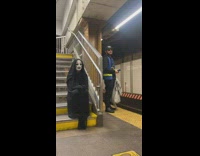 Person dressed as no face from spirited away