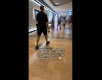 Woman pranks boyfriend follows him around mall 