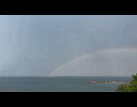 Second rainbow seen faded on top of the rainbow