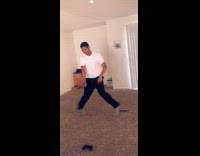Guy living room carpet dancing music 