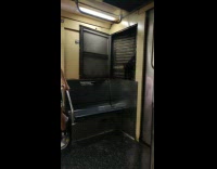 Golden retriever dog tries to eat sausage in whack a mole game with box