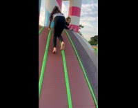 Girl inflatable slide and fall face down