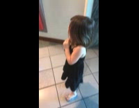 Dad correcting daughter with pork fried rice