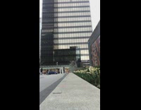 Girl jumps off concrete step for photo